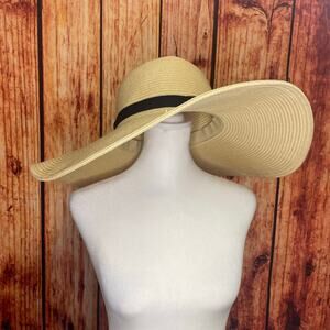 Cappelli Straworld, Inc. wide brim floppy hat with black ribbon 18" across